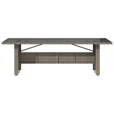 vidaXL Zahradní stůl se skleněnou deskou šedý 240x90x75 cm polyratan