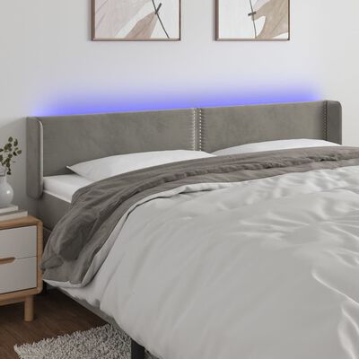 vidaXL Čelo postele s LED světle šedé 163 x 16 x 78/88 cm samet