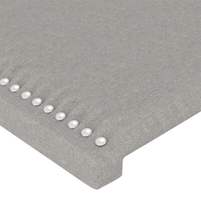 vidaXL Čelo postele typu ušák světle šedé 147x16x118/128 cm textil