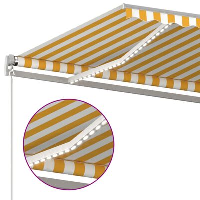 vidaXL Ručně zatahovací markýza s LED světlem 600 x 300 cm žlutobílá