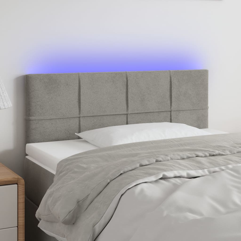 vidaXL Čelo postele s LED světle šedé 100 x 5 x 78/88 cm samet