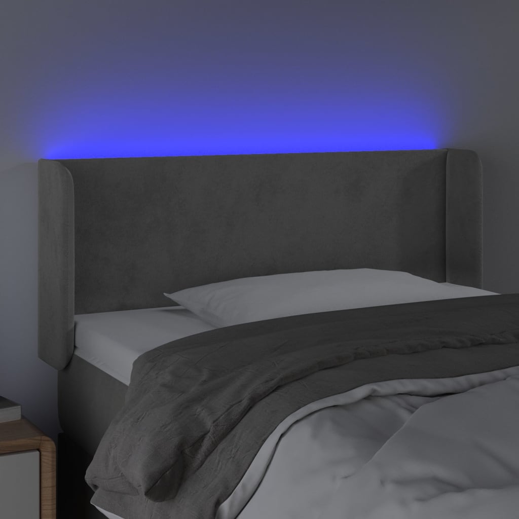 vidaXL Čelo postele s LED světle šedé 83 x 16 x 78/88 cm samet